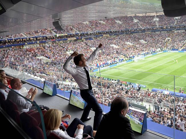 French President Emmanuel Macron reacts during the Russia 2018 World Cup final football match between France and Croatia at the Luzhniki Stadium in Moscow on July 15, 2018. / AFP PHOTO / SPUTNIK / Alexey NIKOLSKY