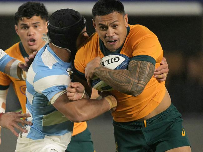 Australia's Wallabies centre Len Ikitau (R) against Argentina in August. Picture: Juan Mabromata / AFP