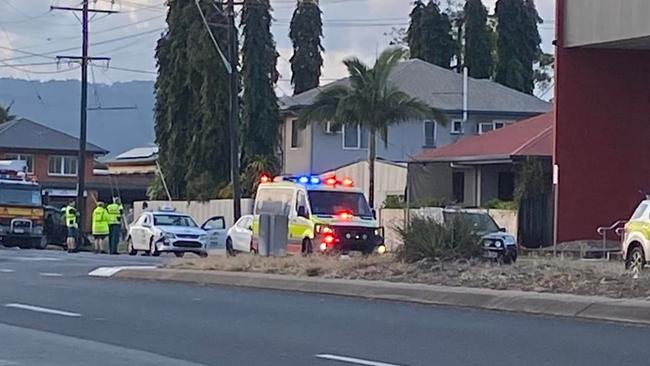 Police at the scene of a damaged taxi on Friday afternoon, alleged to be rammed by a stolen car on Aumuller St. Picture: Facebook