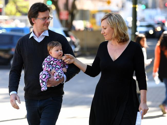 Greens senator Larissa Waters arrives with her partner Jeremy Gates and their daughter Alia Joy to announce her resignation in Brisbane. Picture: Dan Peled/AAP