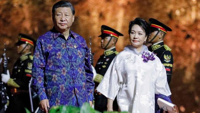 China's President Xi Jinping and his wife Peng Liyuan. Picture: Willy Kurniawan/AFP