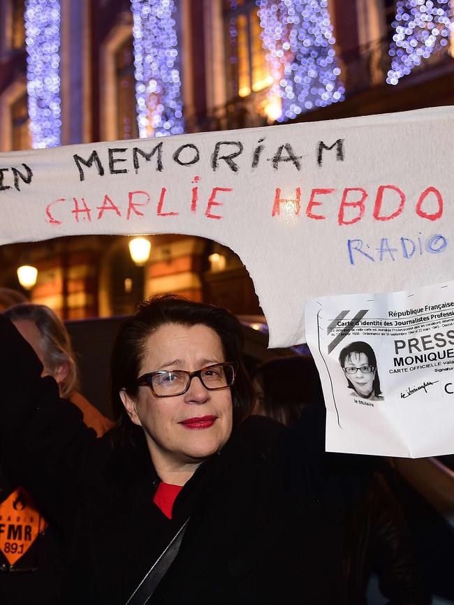 A woman demonstrates in Toulouse for press freedom. Picture: AFP/Eric Cabanis