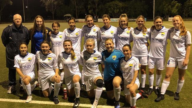 Coach Keith Garland with Gold Coast United's under-15 girls' team.