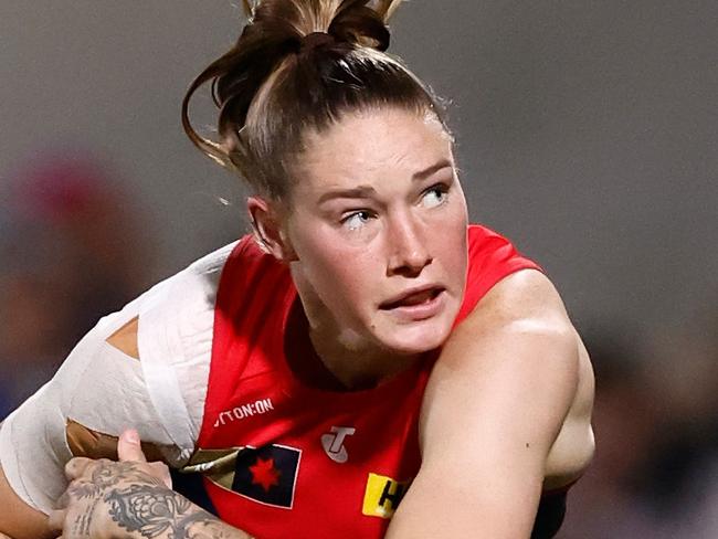 MELBOURNE, AUSTRALIA - SEPTEMBER 01: Tayla Harris of the Demons kicks the ball during the 2023 AFLW Round 01 match between the Melbourne Demons and the Collingwood Magpies at IKON Park on September 01, 2023 in Melbourne, Australia. (Photo by Michael Willson/AFL Photos via Getty Images)