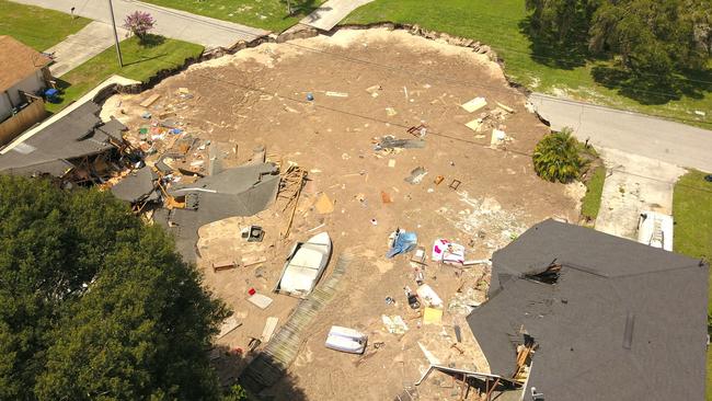 Florida sinkhole, Land O’ Lakes natural disaster swallows homes, boat ...