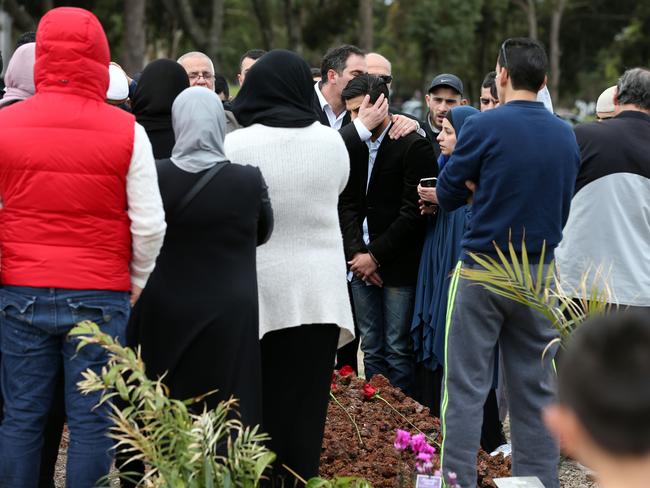 Jihad Dib comforts his brother, Billy Dib at Sara’s burial in Rookwood Cemetery / Picture: Sam Ruttyn