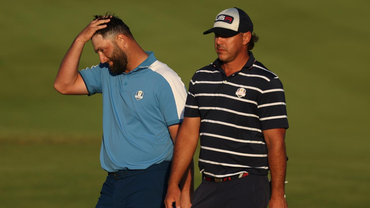 Brooks Koepka (right) wasn’t too impressed with Jon Rahm’s antics. (Photo by Patrick Smith/Getty Images)