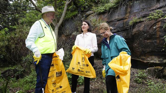 Clean Up Australia founder Ian Kiernan AO with Premier Gladys Berejiklian and Environment Minister Gabrielle Upton cleaning up Clifton Gardens Reserve, Mosman, last year. Picture: Justin Lloyd