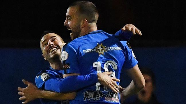 Ionannis Simosis and Fausto Erba celebrate a goal during Adelaide Olympic’s FFA Cup round-of-32 win over Perth’s Floreat Athena. Picture: Mark Brake/Getty Images