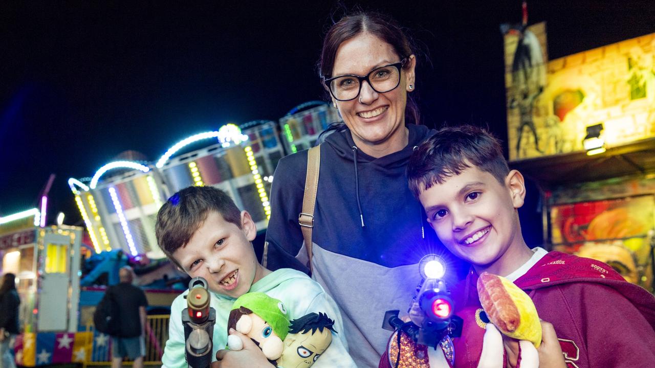 At sideshow alley are (from left) Keiran McErlean, Louise Mischke and Leon Murray at the 2022 Toowoomba Royal Show, Saturday, March 26, 2022. Picture: Kevin Farmer