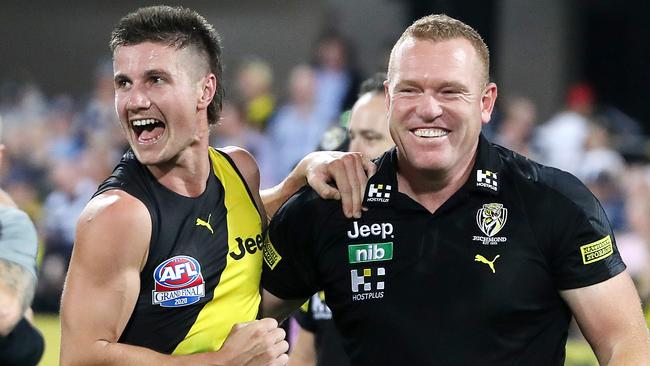 Former Richmond assistant coach Justin Leppitsch (right) with Tigers defender Liam Baker after the club’s 2020 Grand Final win at the Gabba. Picture: Sarah Reed