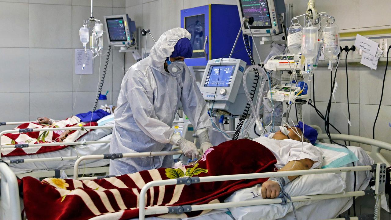 An Iranian medic treats a patient infected with coronavirus at a hospital in Tehran on March 1. Picture: Koosha Mahshid Falahi/Mizan News Agency/AFP