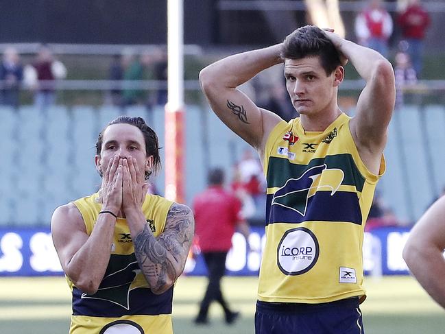 16/09/18 - SANFL - Preliminary Final - Eagles v North Adelaide at the Adelaide Oval. James Boyd and Luke Thompson stand in disbelief after the loss. Picture SARAH REED