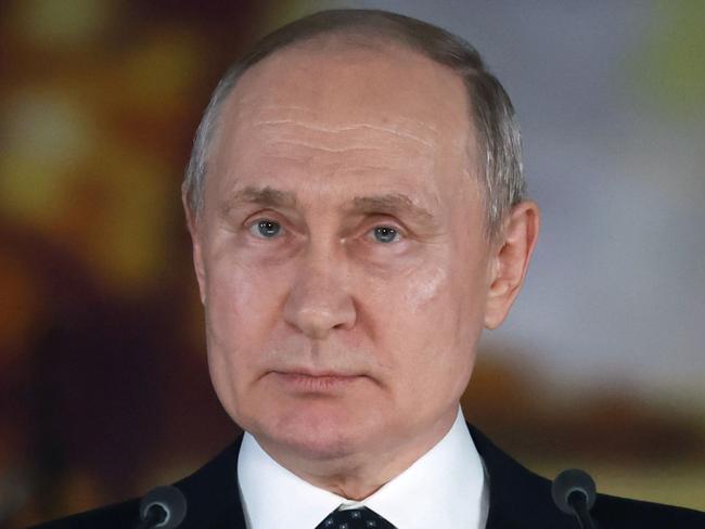 In this pool photograph distributed by Russian state agency Sputnik, Russia's President Vladimir Putin addresses the audience during a concert at the Gazprom Arena stadium in Saint Petersburg on January 27, 2024, as part of events marking the 80th anniversary of the liberation of Leningrad from Nazi blockade during WWII. (Photo by Vyacheslav PROKOFYEV / POOL / AFP)