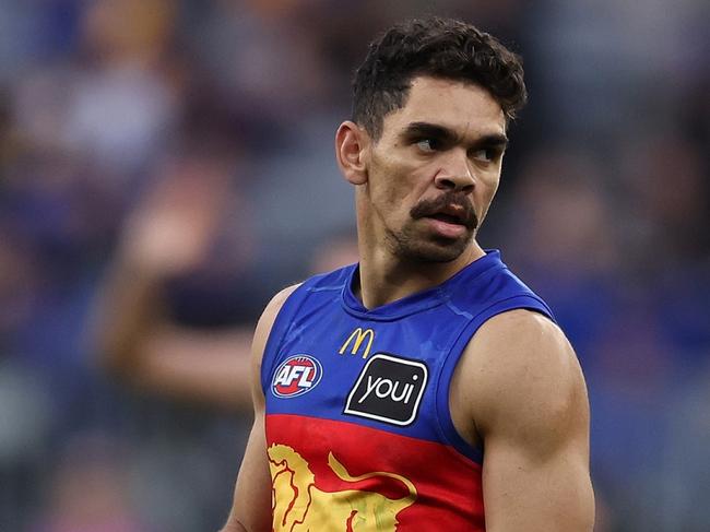 PERTH, AUSTRALIA - JULY 14: Charlie Cameron of the Lions lines up a kick on goal during the 2024 AFL Round 18 match between the West Coast Eagles and the Brisbane Lions at Optus Stadium on July 14, 2024 in Perth, Australia. (Photo by Will Russell/AFL Photos via Getty Images)