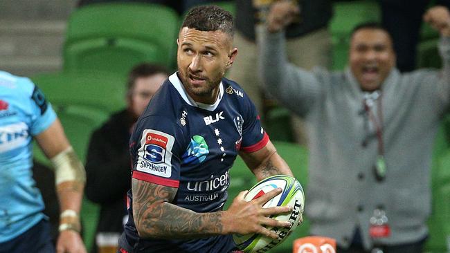 Quade Cooper of the Rebels scores a try during the Round 16 Super Rugby match between the Melbourne Rebels and the NSW Waratahs at AAMI Park in Melbourne, Friday, May 31, 2019. (AAP Image/Hamish Blair) NO ARCHIVING, EDITORIAL USE ONLY