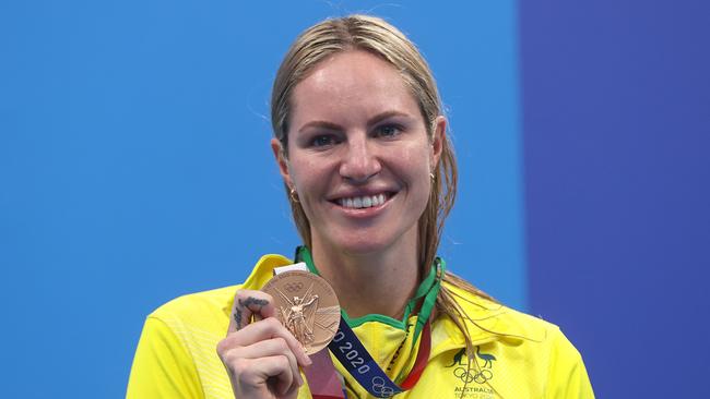 Silver medalist Emily Seebohm poses on the podium during the medal ceremony for the Women's 200m Backstroke Final at Tokyo Aquatics Centre in Tokyo.