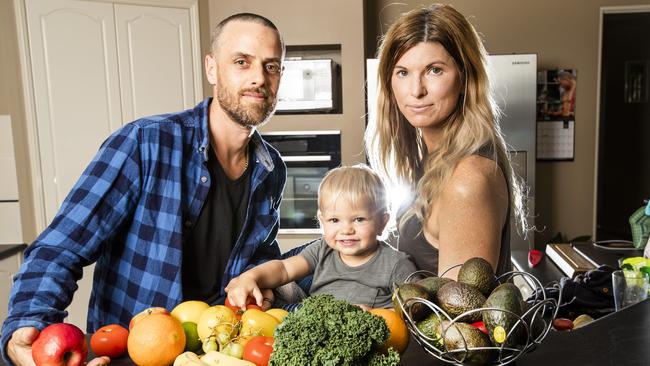 Matt Goss, his wife Amanda and 17-month-old Morrison are concerned rising fruit prices will lead to more people eating less healthy meals. Picture: Nigel Hallett