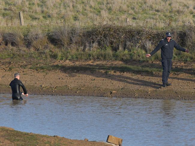 Police divers on the scene. Picture: Ian Wilson