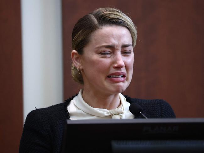 US actress Amber Heard testifies at the Fairfax County Circuit Courthouse in Fairfax, Virginia, on May 5, 2022. - Actor Johnny Depp is suing ex-wife Amber Heard for libel after she wrote an op-ed piece in The Washington Post in 2018 referring to herself as a âpublic figure representing domestic abuse.â (Photo by Jim LO SCALZO / POOL / AFP)