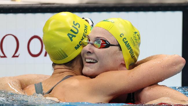 Emma McKeon celebrates with Cate Campbell of Team Australia after winning the gold medal and breaking the Olympic record in the Women’s 50m Freestyle. Picture: Getty