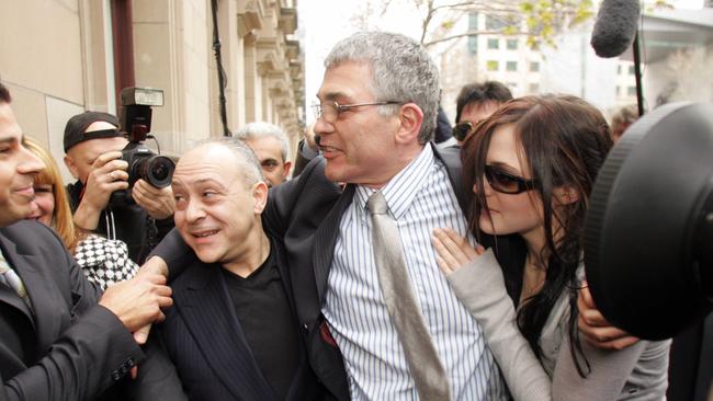 Mick Gatto walks out of the Melbourne Supreme Court a free man in 2005. Picture: David Crosling