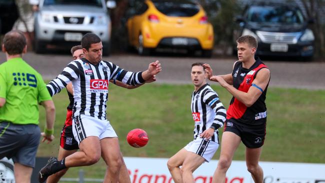 Kristian Roocke in action for Payneham Norwood Union. He produced a strong season for Old Iggies after leaving the Falcons. Picture: Brayden Goldspink