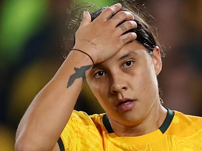 SYDNEY, AUSTRALIA - AUGUST 16: Sam Kerr of Australia reacts after England's second goal  during the FIFA Women's World Cup Australia & New Zealand 2023 Semi Final match between Australia and England at Stadium Australia on August 16, 2023 in Sydney, Australia. (Photo by Alex Pantling - FIFA/FIFA via Getty Images)