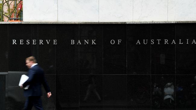 A pedestrian walks past the Reserve Bank of Australia (RBA) building in Sydney. Picture: AAP