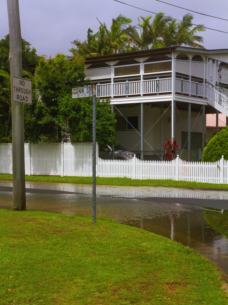 Flood waters filling up bayside streets. PHOTO CREDIT: Dianna Jean Photography.