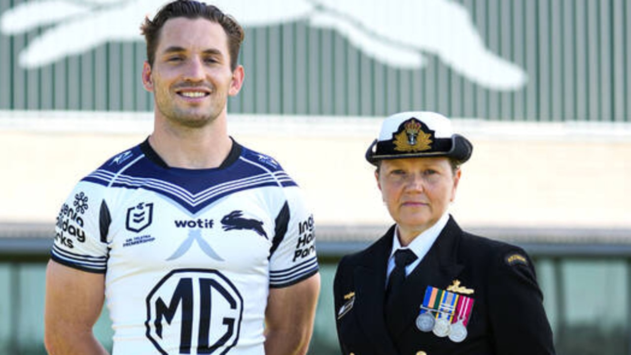 Souths captain Cameron Murray with a member of the Royal Australian Navy. Picture: Rabbitohs Digital