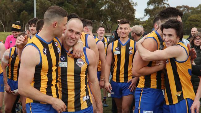 St Bernard’s players start their premiership celebrations after the final siren. Picture: David Crosling