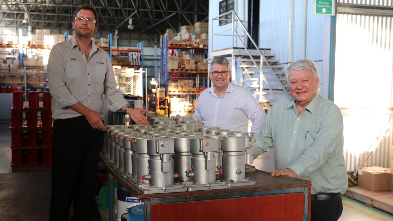 Minister Keith Pitt, Flynn MP Ken O'Dowd and Ausproof's Aston Marks at their Gladstone manufacturing facility. The company produces and exports high voltage connectors to mining companies globally.