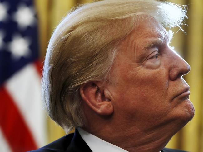 President Donald Trump listens during a meeting with American manufacturers in the Oval Office of the White House, Thursday, Jan. 31, 2019, in Washington. (AP Photo/Jacquelyn Martin)