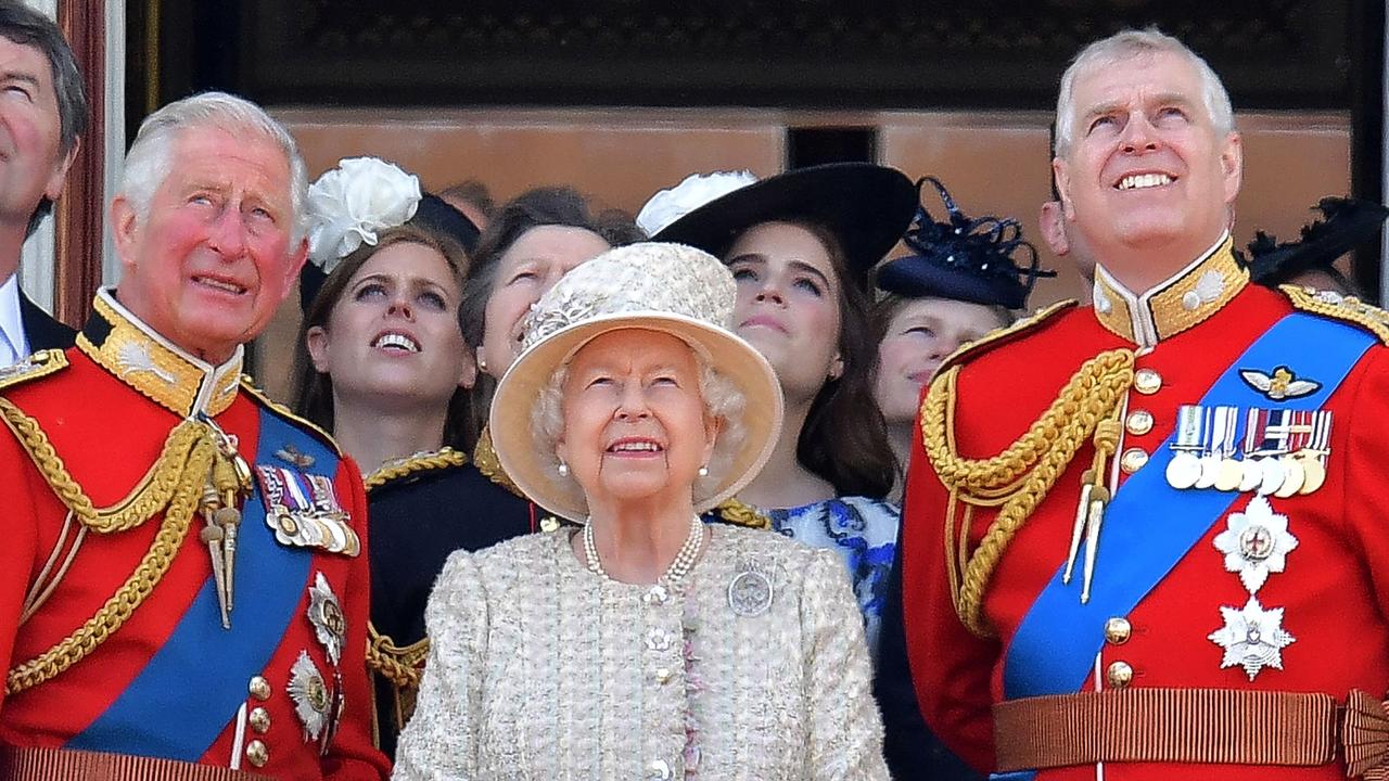 Prince Andrew (right) was forced to step down from his royal duties late last year. Picture: Daniel Leal-Olivas/AFP