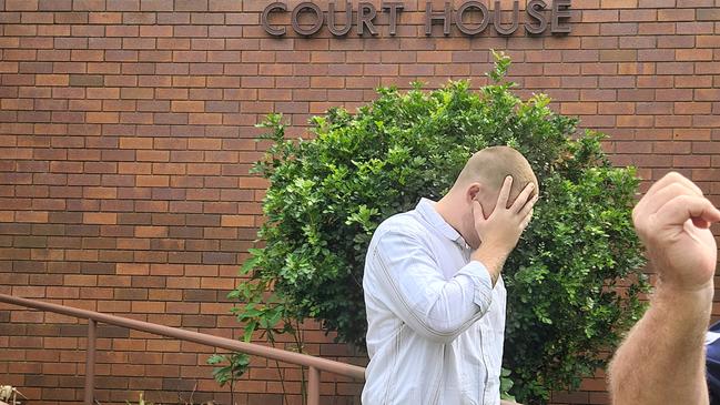 Lochlin Bailey Smith, 19, leaves Yeppoon Courthouse after being sentenced on Thursday, March 13, with a support person trying to shield him from the media.