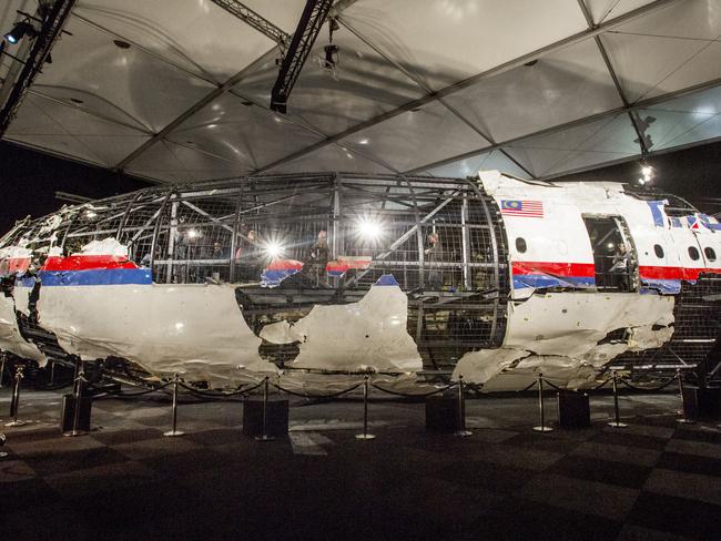 MH17 crash report from Dutch Safety Board at the Gilze-Rijen airbase in Holland . Plane partially reconstructed as crash report blames Buk missile strike. Pic Ella Pellegrini