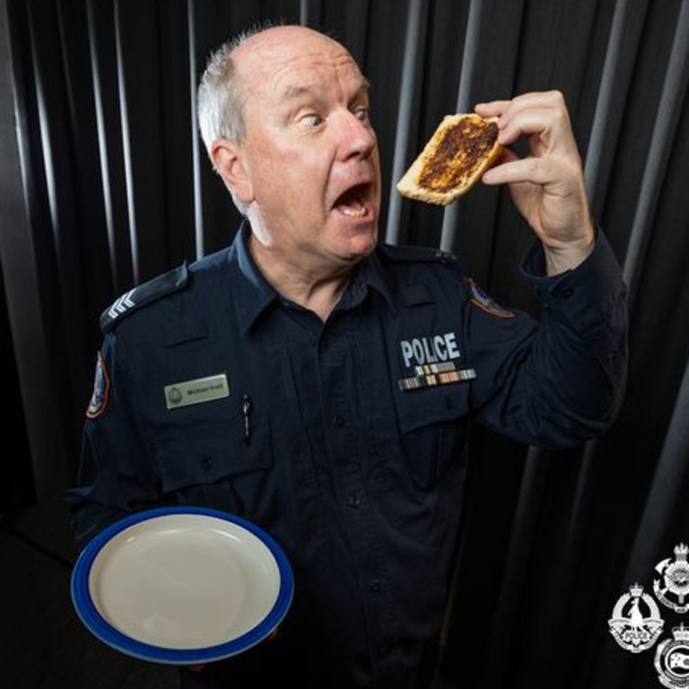 NT Police Recruitment posted this shot of an officer about to devour a slice of Vegemite on toast in a bid to lure New Zealand recruits.