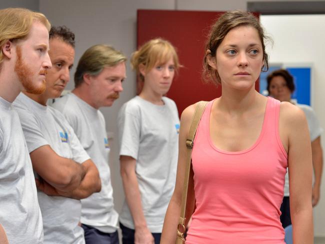 Marion Cotillard, right, appears in a scene from "Two Days, One Night."