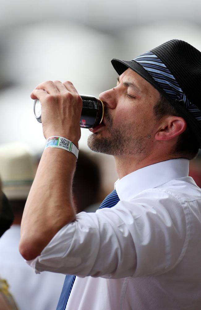 Melbourne Cup Day 2014 at Flemington Racecourse. The race is over time to knock back a few. Picture: Mark Stewart