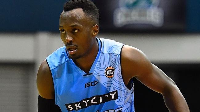 Cedric Jackson of the Breakers looks to pass the ball during the round nine NBL match between the Townsville Crocodiles and the New Zealand Breakers.