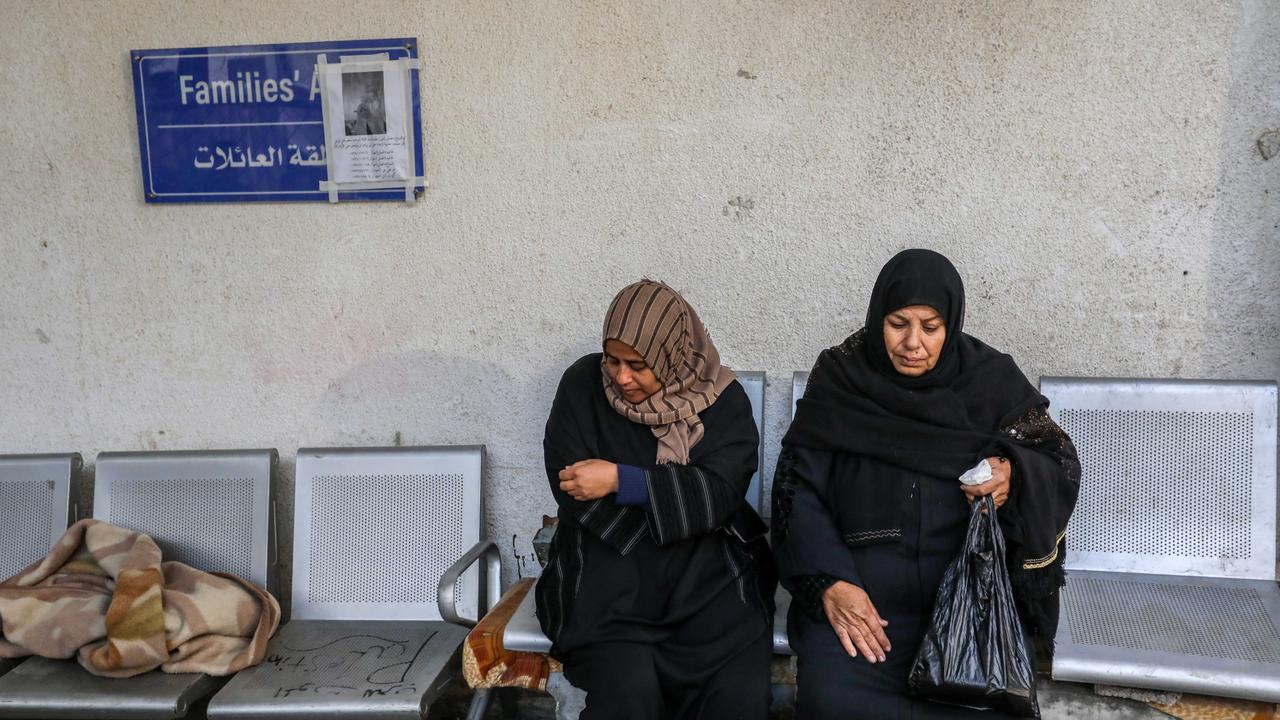 People mourn as they collect the bodies of friends and relatives killed in Rafah. Picture: Getty Images