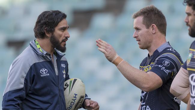 Johnathan Thurston of the Cowboys talks with Michael Morgan during warm up before the NRL elimination final between the Cronulla Sutherland Sharks and the North Queensland Cowboys at Allianz Stadium in Sydney, Sunday, September 10, 2017. (AAP Image/Craig Golding) NO ARCHIVING, EDITORIAL USE ONLY