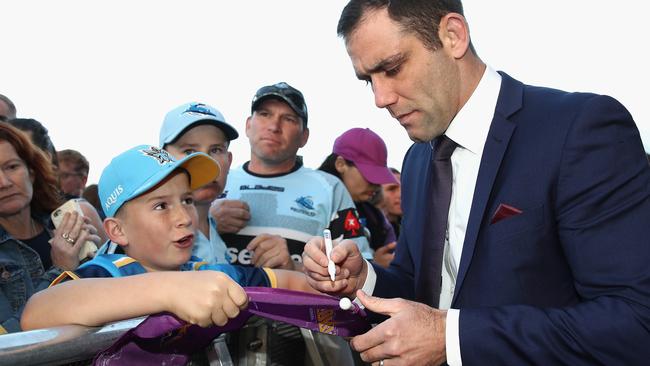 Cameron Smith signs autographs in Sydney ahead of the 2016 nrl grand final. Picture: Getty Images