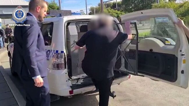 The man, 50, of The Entrance, is arrested by Strike Force Trawler officers and later charged with grooming a child for sex. Picture: NSW Police