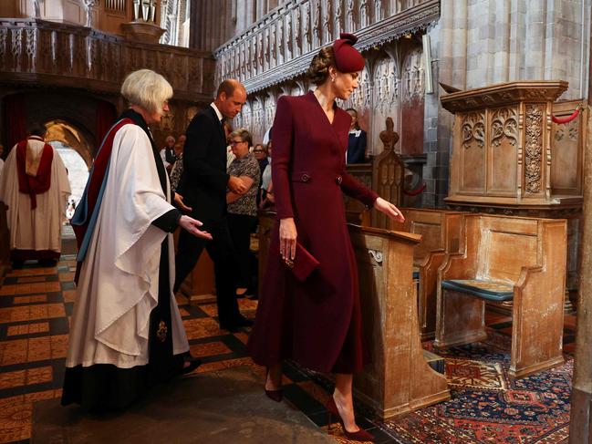 Britain's Prince William, Prince of Wales and Britain's Catherine, Princess of Wales are shown to their seats by Sarah Rowland Jones. Picture: AFP