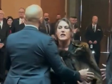 Independent Senator Lidia Thorpe is taken away by security as she yells at the King and Queen inside Parliament House in Canberra. Picture: NewsWire