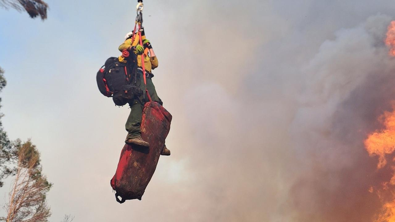 Firefighters being winched into remote areas to battle blazes