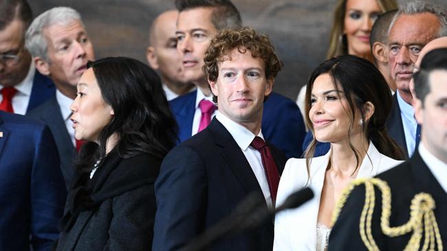 Priscilla Chan faces the other direction as husband Mark Zuckerberg stands next to Lauren Sanchez. Picture: AFP