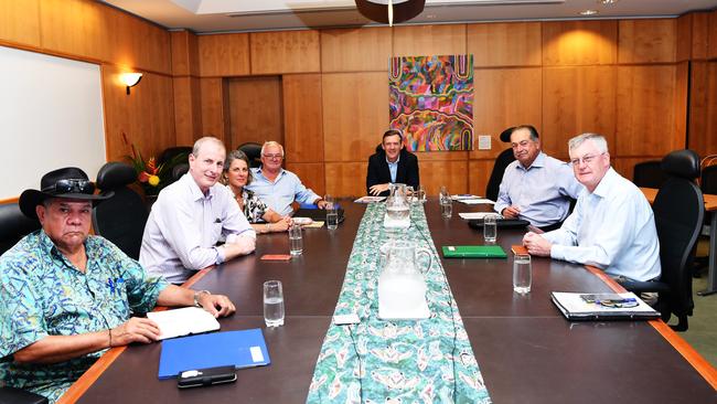 Chief Minister Michael Gunner, centre, and Territory Economic Reconstruction Commission members at a roundtable conference in the NT Cabinet room yesterday. Picture: Katrina Bridgeford